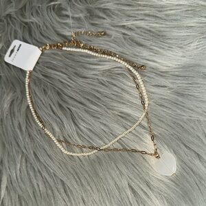 Faux Gold with Faux Pearl necklace.